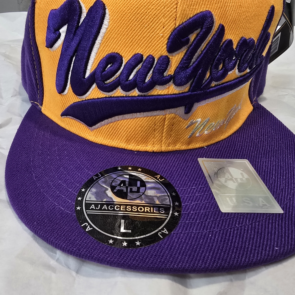 NWT! New York Cap - AJ Accessories. Purple/yellow